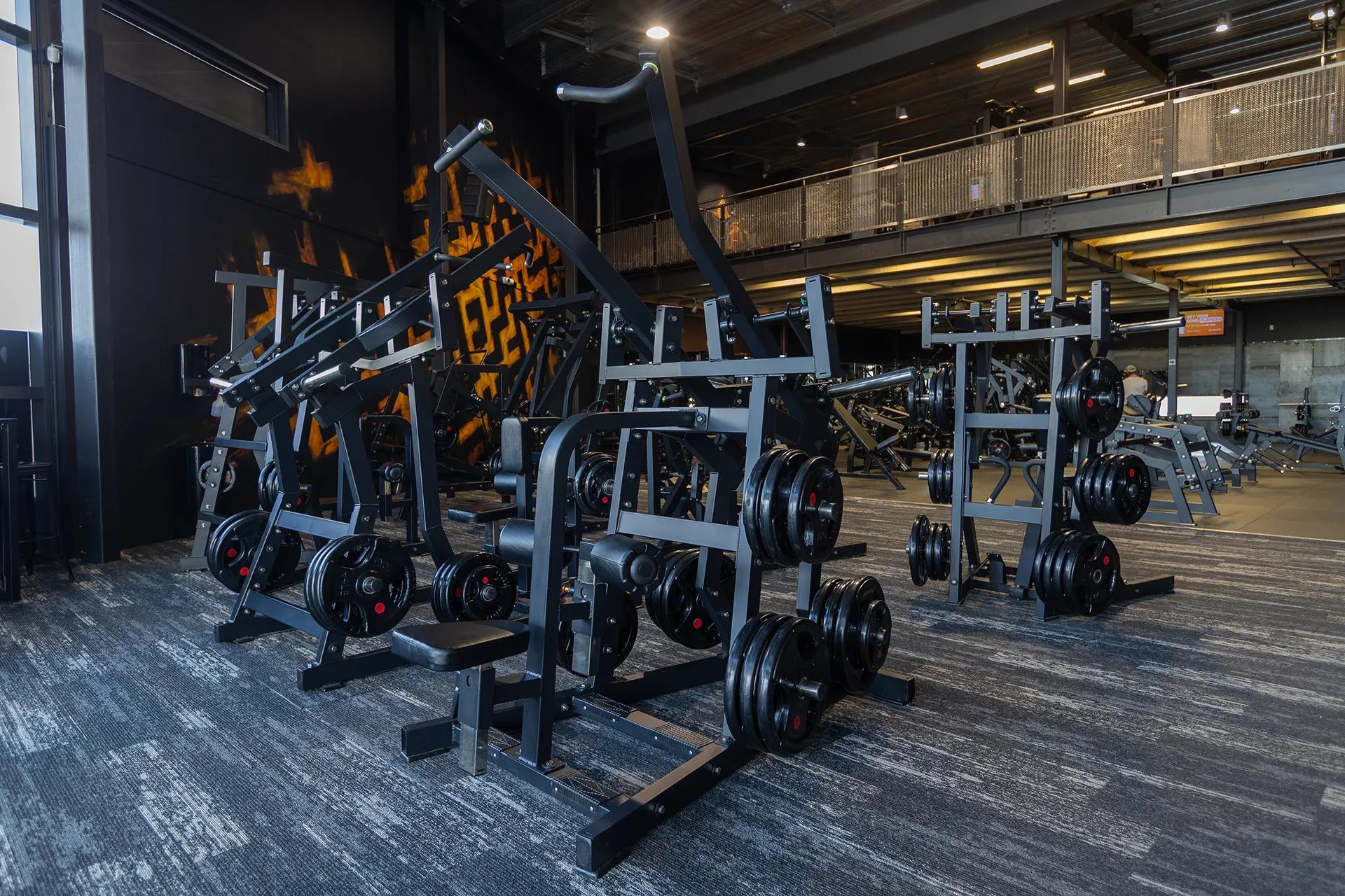 Plate-loaded machines on the training floor at Inception Gym Christchurch